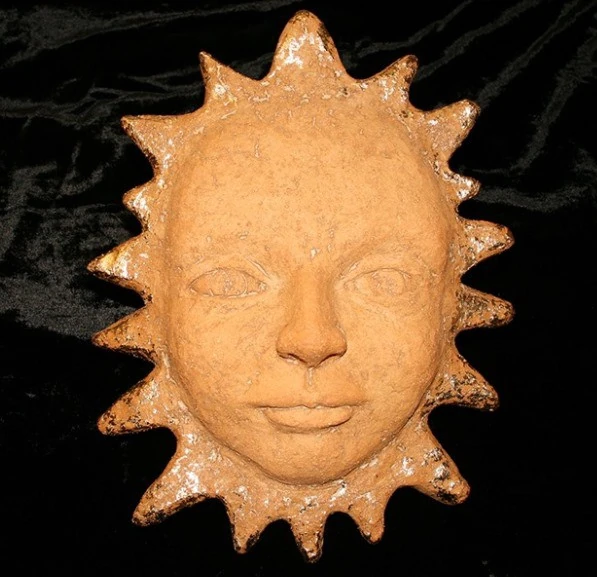image of Finnish goddess. image appears to be a face like a sun