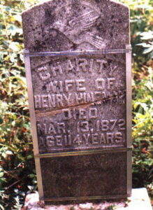 grave stone of Charity Coon reads Charity wife of Henry Hinseman died May 13, 1872 aged 114 years