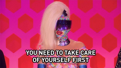 Image of RuPaul facing forward. Her face is covered in a couture helmet. blonde hair to the left. captioned: you need to take care of yourself first. From 2018